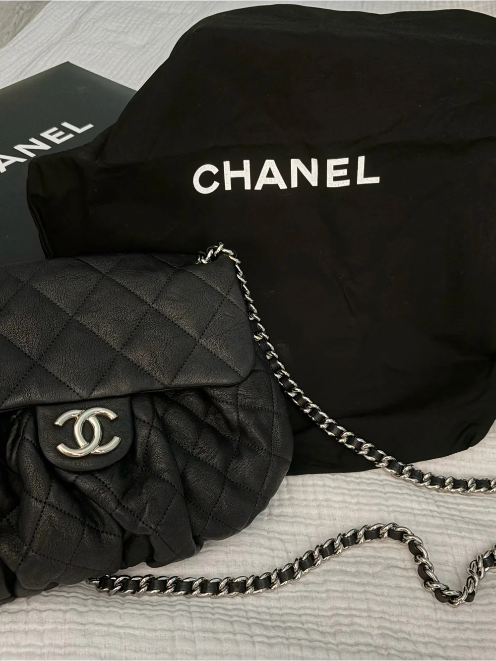 CHANEL Black Quilted Leather Small Flap Crossbody with Silver Chain